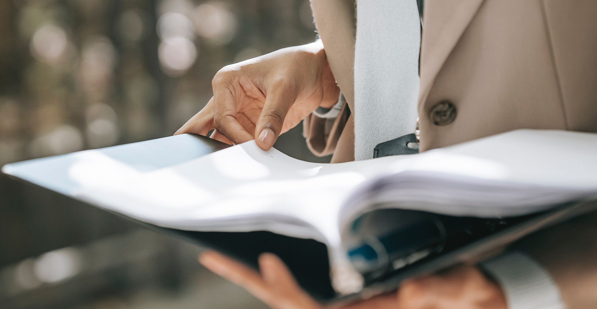 person looking through documents