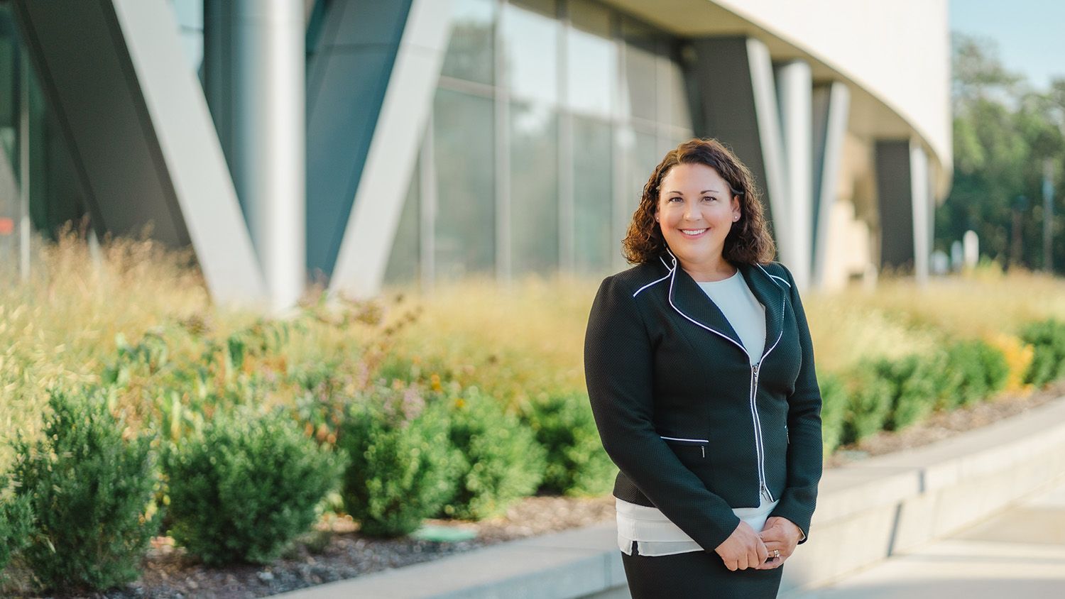 Professional licensure defense attorney Diane Bellquist in front of Johnson County District Courthouse in Olathe, KS