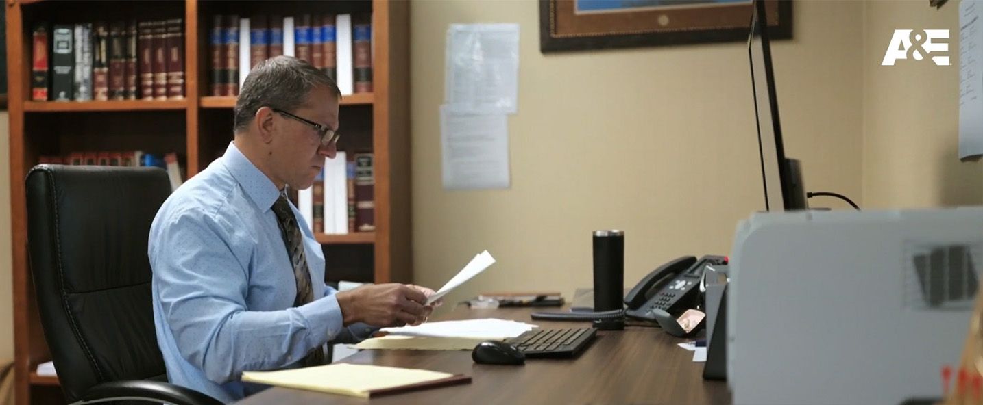 
                    JHC criminal defense attorney Jess Hoeme prepares his defense of Ashley Pearson in his Wichita office.